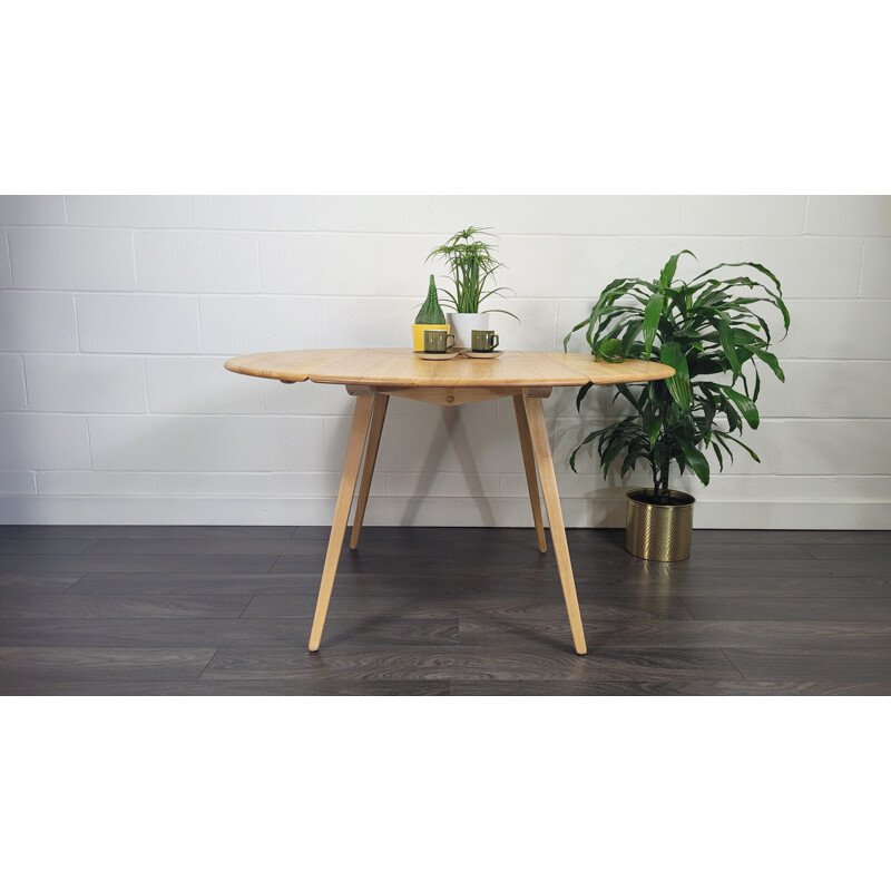 Table ronde vintage à abattant en bois par Ercol, 1960