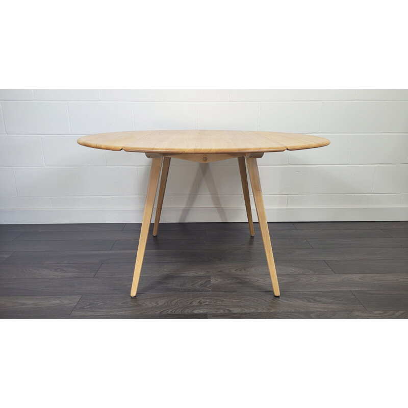 Table ronde vintage à abattant en bois par Ercol, 1960