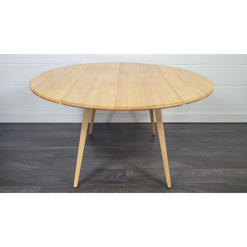 Table ronde vintage à abattant en bois par Ercol, 1960