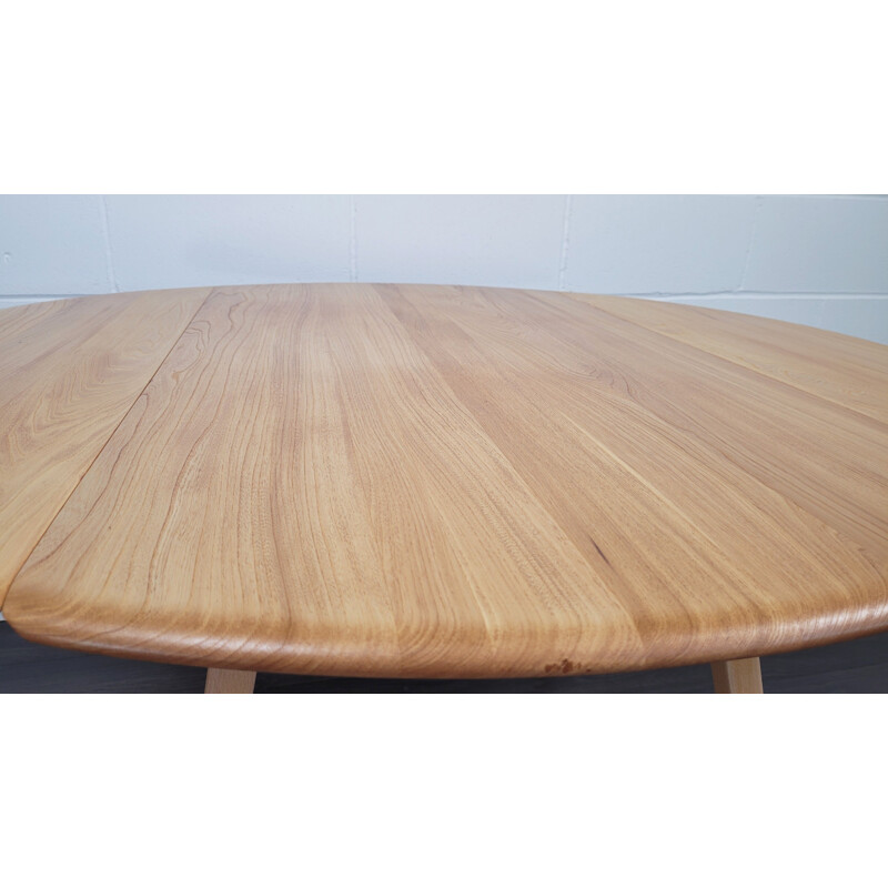 Vintage round table with wooden top by Ercol, 1960