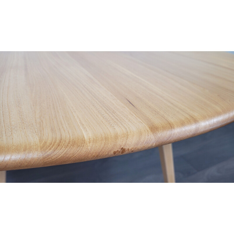 Vintage round table with wooden top by Ercol, 1960