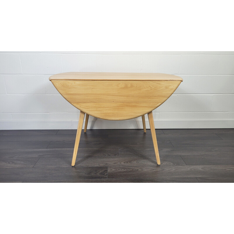 Table ronde vintage à abattant en bois par Ercol, 1960