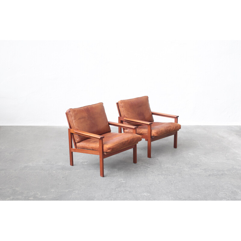 Pair of vintage leather and teak wood armchairs by Illum Wikkelsø for Niels Eilersen, Danish 1960s