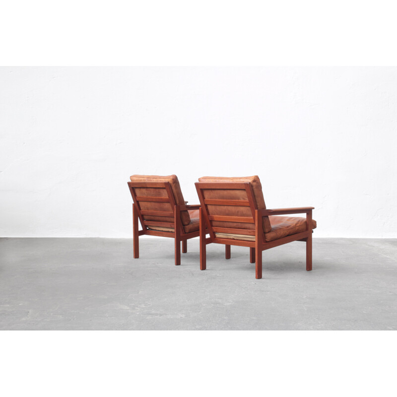 Pair of vintage leather and teak wood armchairs by Illum Wikkelsø for Niels Eilersen, Danish 1960s