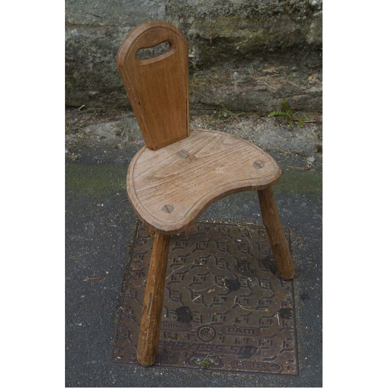 Vintage Brutalist design chair in solid wood, 1940