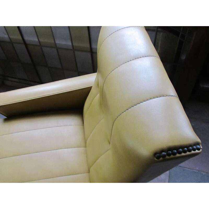 Pair of Italian lounge chairs in mustard leatherette and wood - 1960s