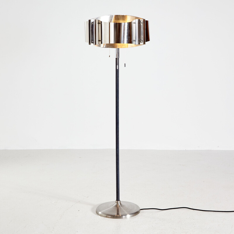 Vintage metal floor lamp with wavy lampshade and black leather