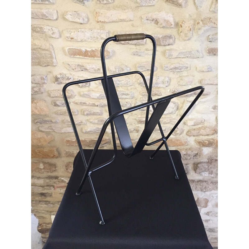 Mid century black magazine rack by Jacques Adnet