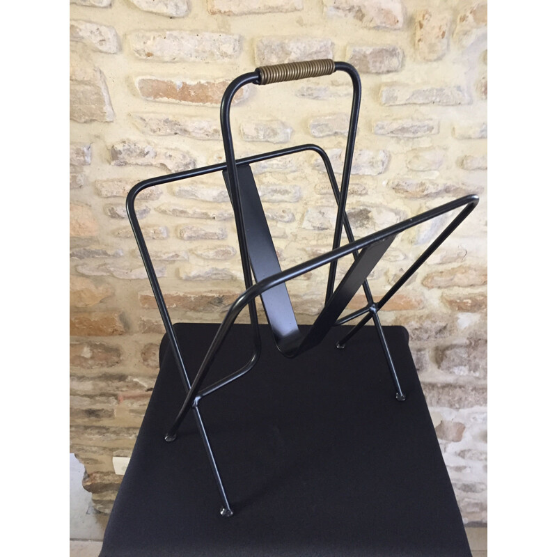 Mid century black magazine rack by Jacques Adnet