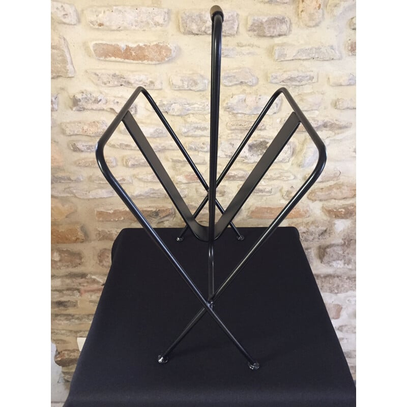 Mid century black magazine rack by Jacques Adnet