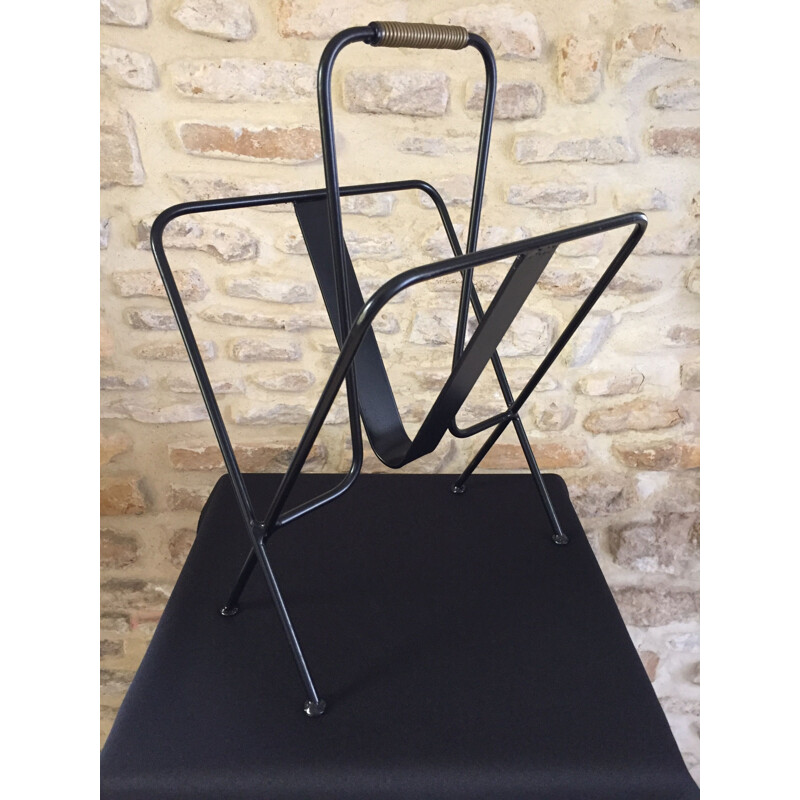 Mid century black magazine rack by Jacques Adnet