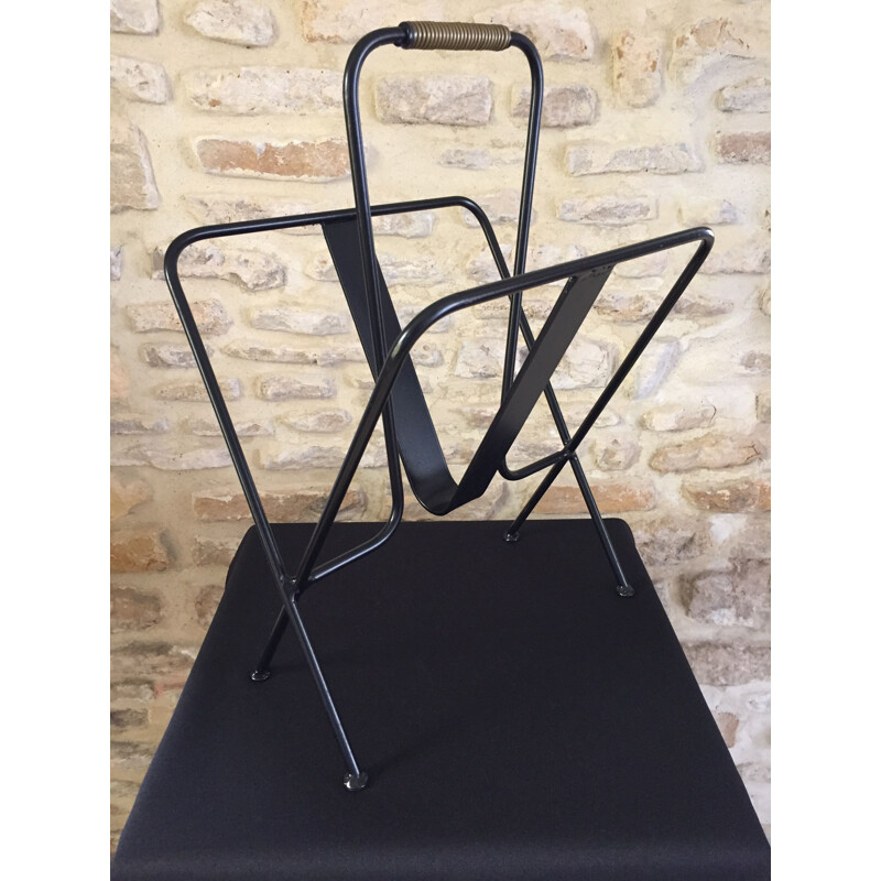 Mid century black magazine rack by Jacques Adnet