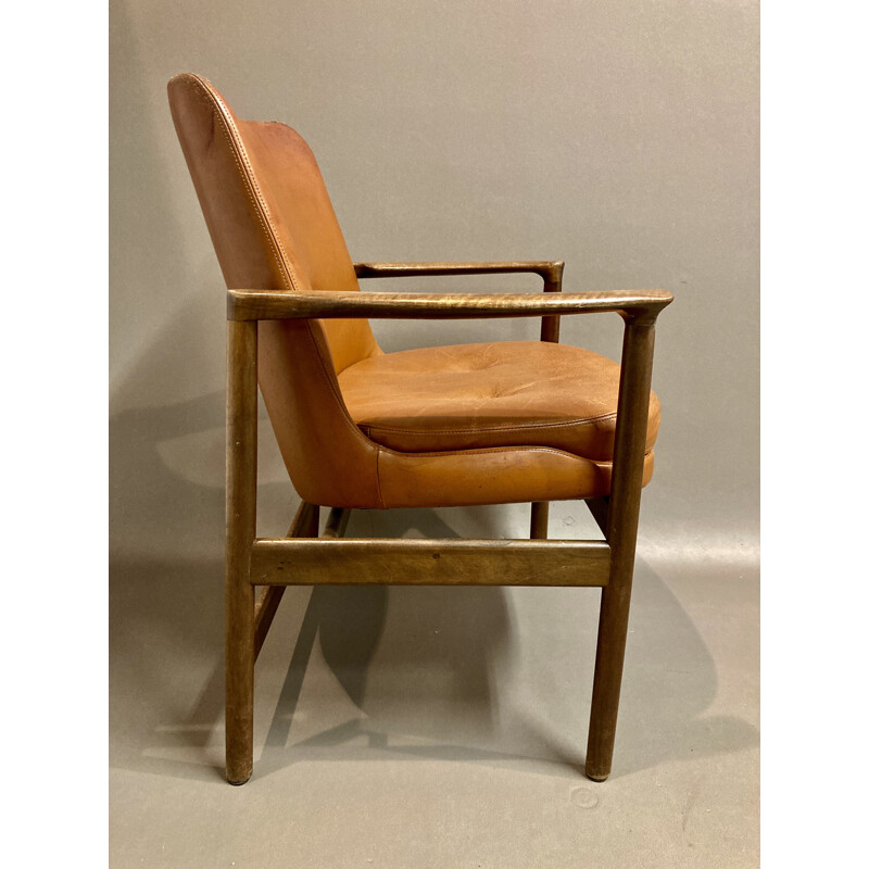 Vintage leather armchair scandinavian by Kofod Larsen 1950s