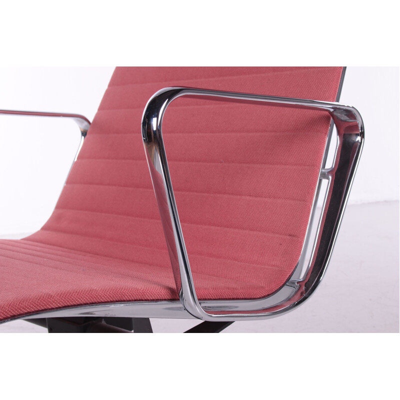 Vintage lounge chair with ottoman by Ray Charles Eames for Vitra