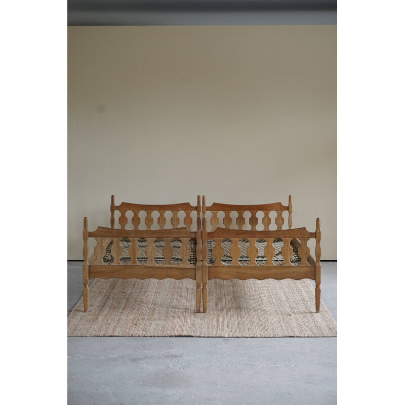 Pair of vintage Danish Razorblade beds in solid oakwood by Henning Kjærnulf for EG Møbler, 1960s