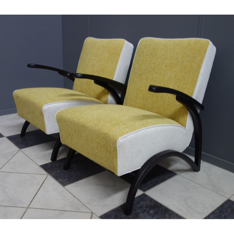 Pair of yellow and white armchairs by Jindrich Halabala, 1930