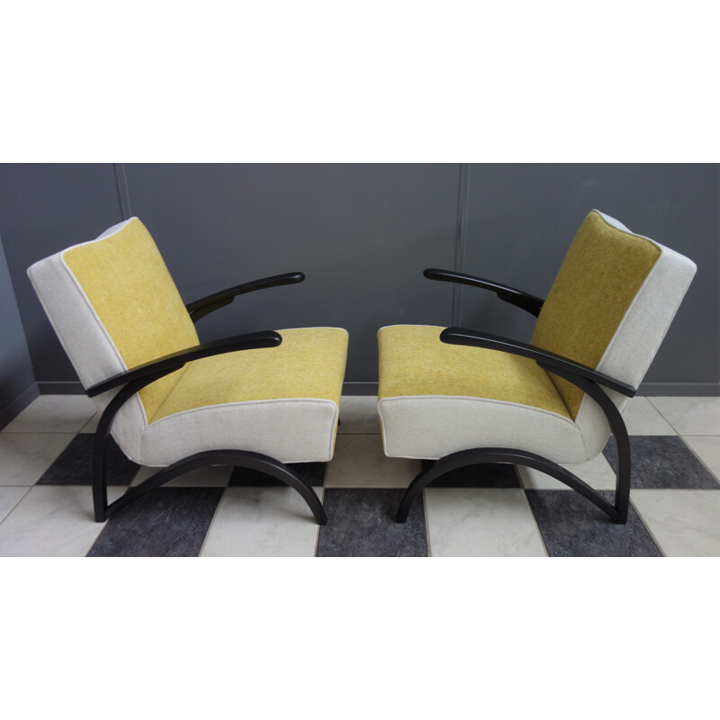 Pair of yellow and white armchairs by Jindrich Halabala, 1930