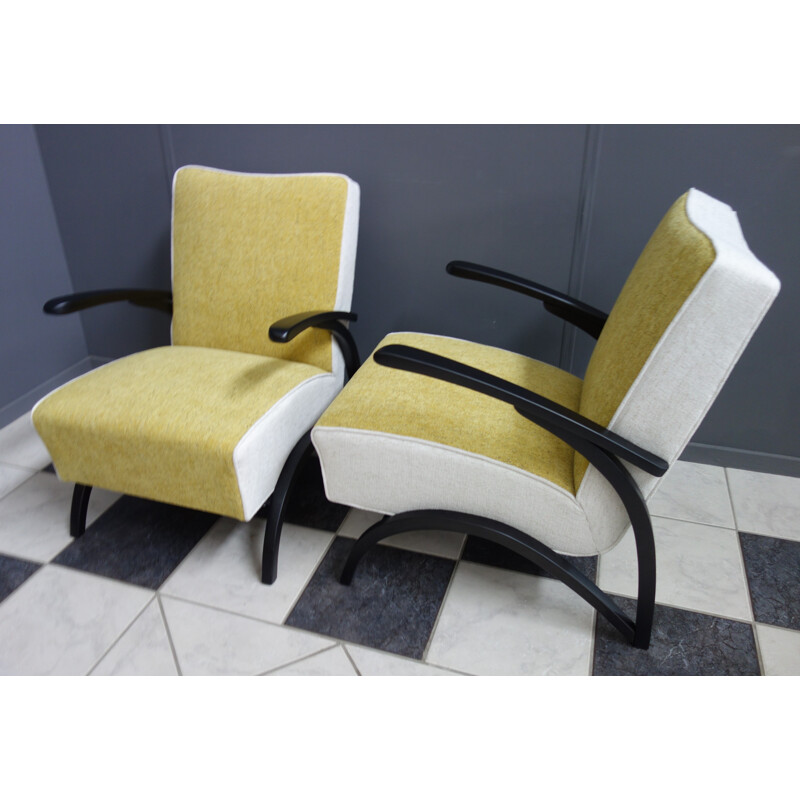 Pair of yellow and white armchairs by Jindrich Halabala, 1930