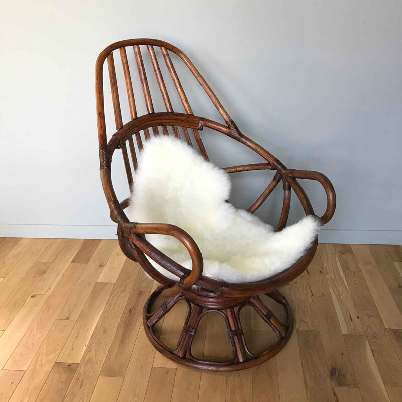 Vintage wooden swivel armchair