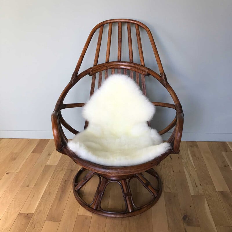 Vintage wooden swivel armchair