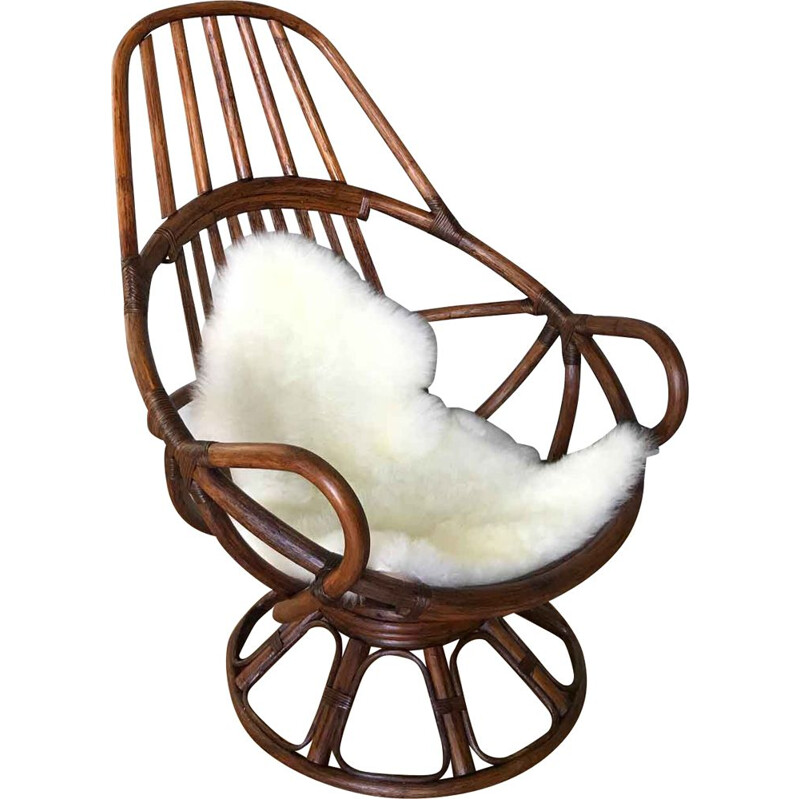 Vintage wooden swivel armchair