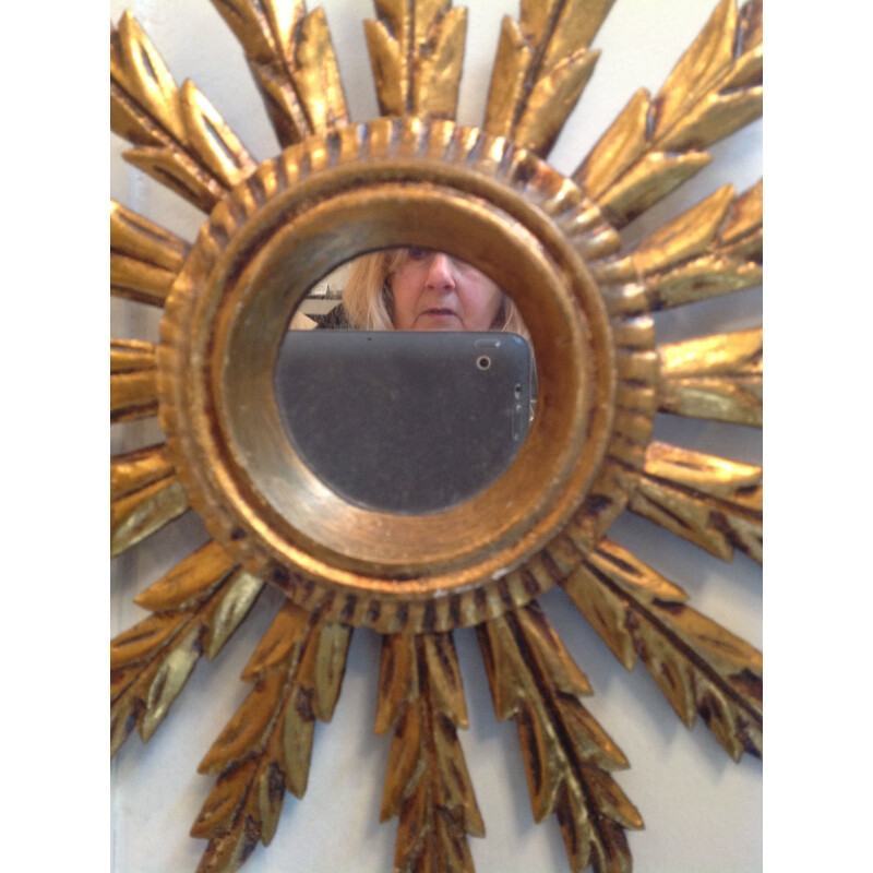 Small sun shaped mirror in gold coloured wood - 1960s
