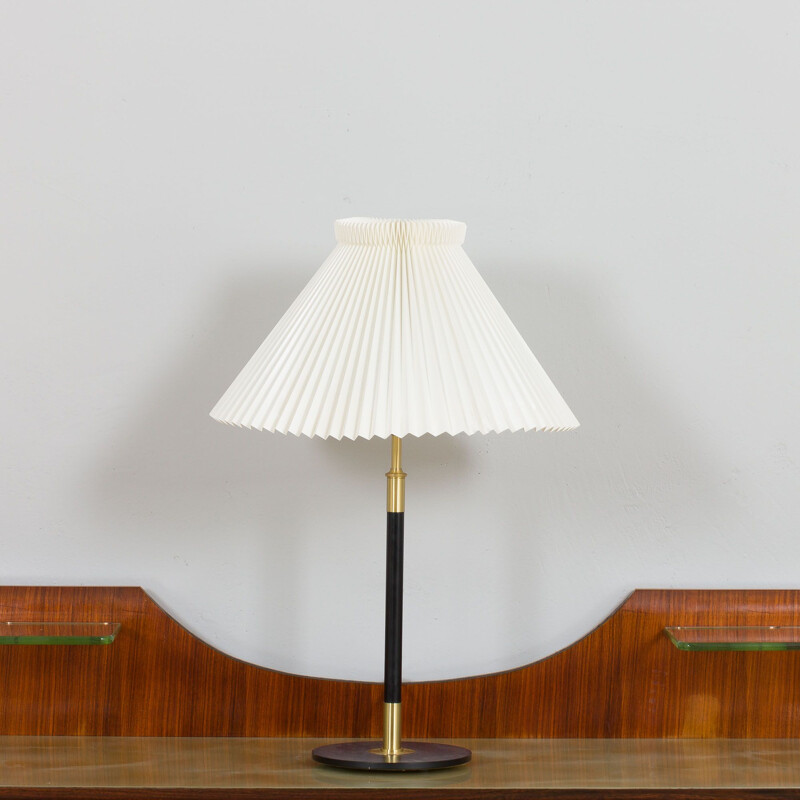 Vintage adjustable table lamp 352 with brass black base by Le Klint