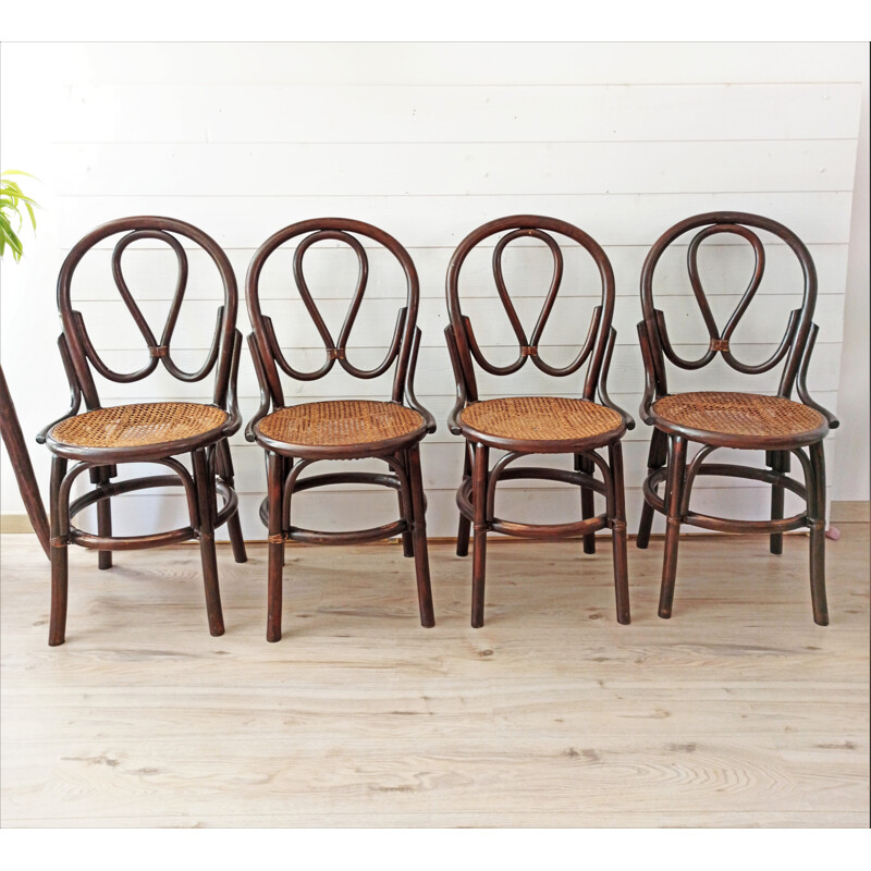 Lot de 4 chaises bistrot vintage cannées par J Pergay, 1982