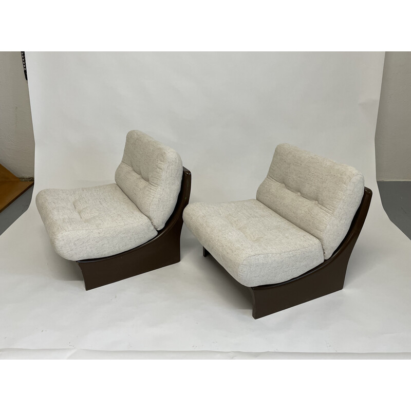 Pair of vintage fiberglass scoop armchairs