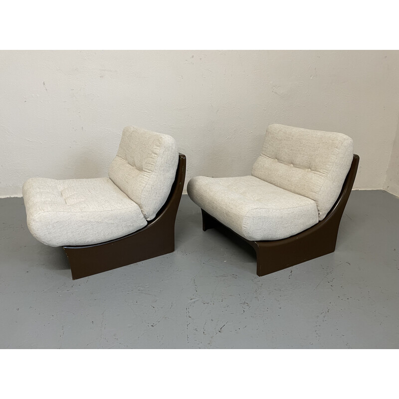 Pair of vintage fiberglass scoop armchairs