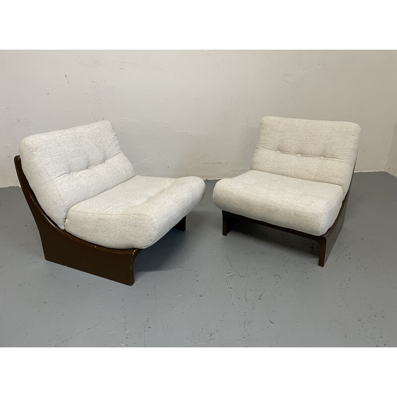 Pair of vintage fiberglass scoop armchairs