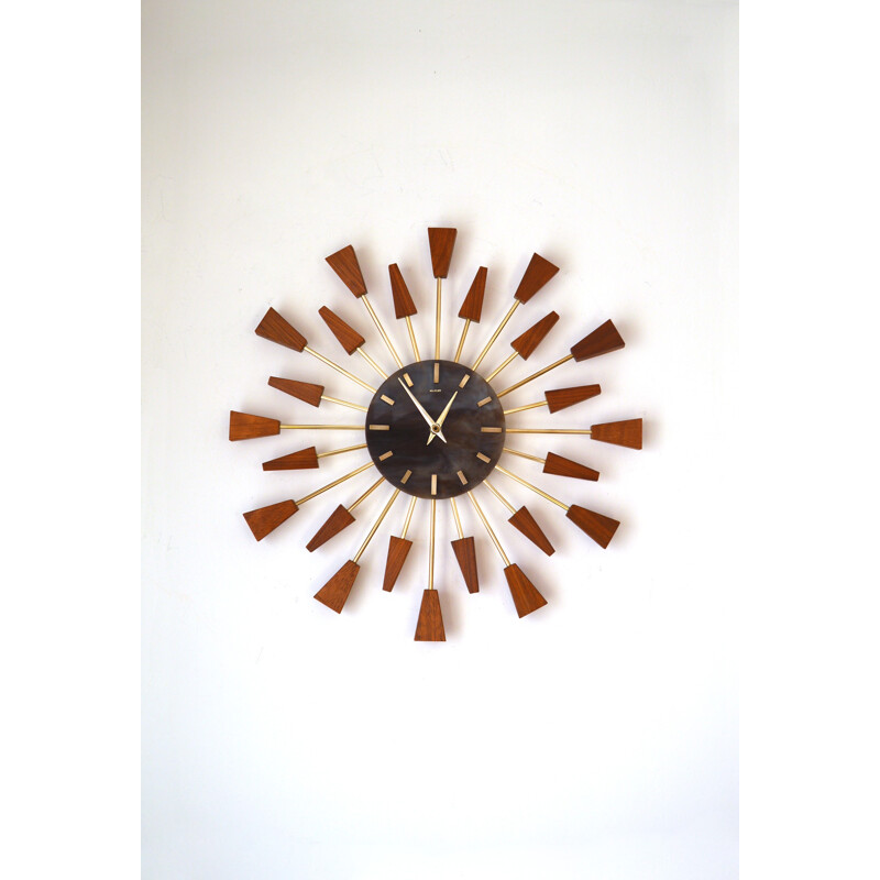 Starburst teak Wallclock by Manley - 1950s