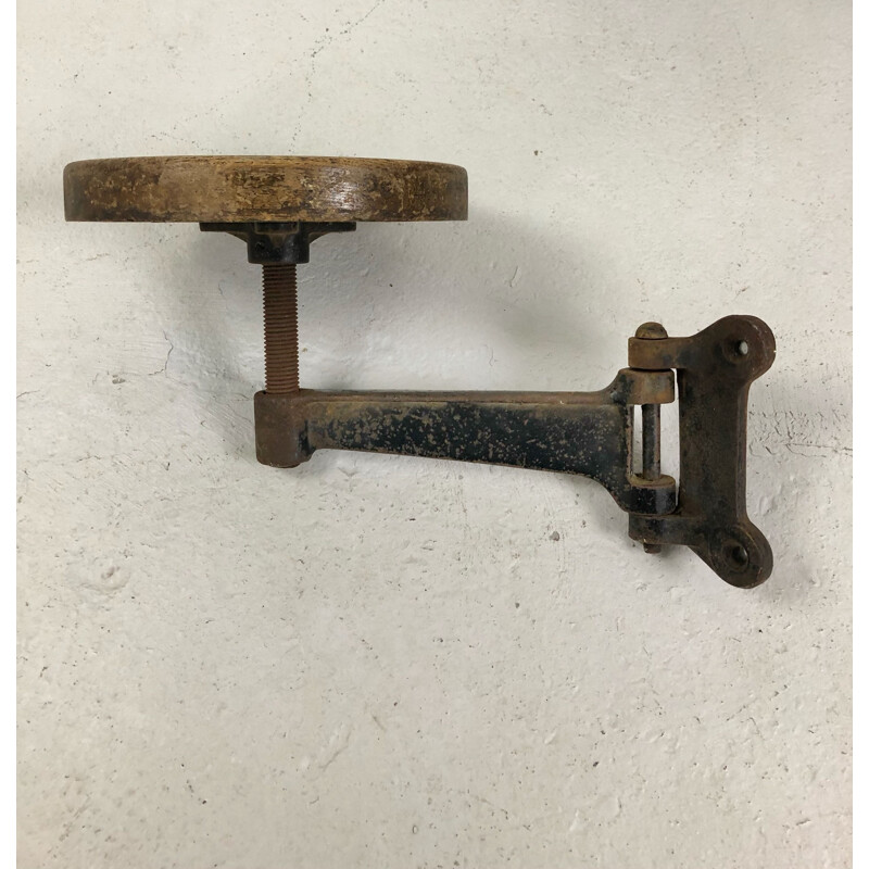 Pair of vintage cast iron and oakwood wall stools