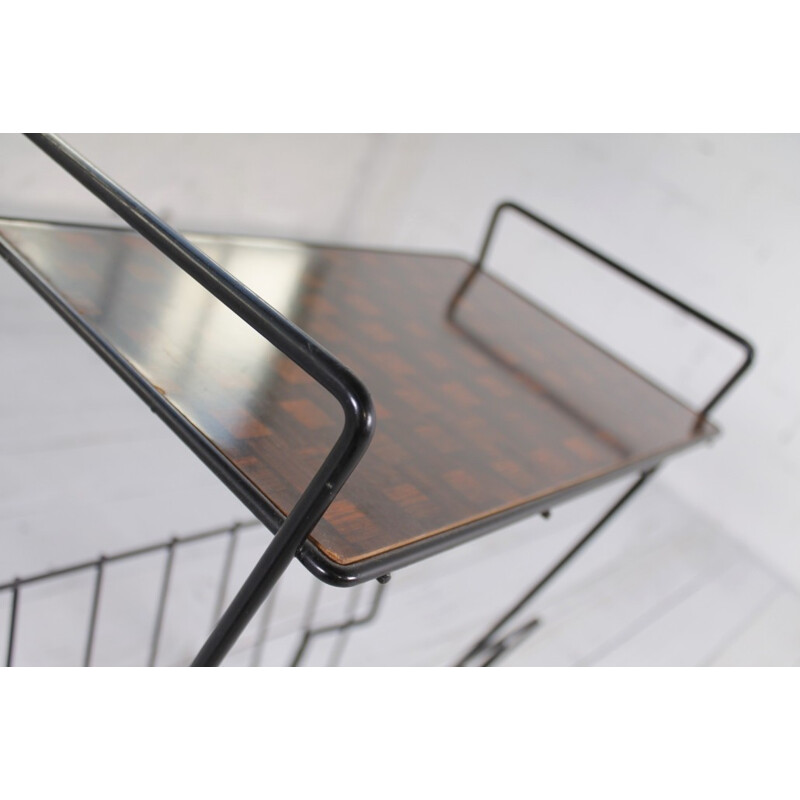 Mid-century magazine rack in black lacquered metal on wheels - 1960s