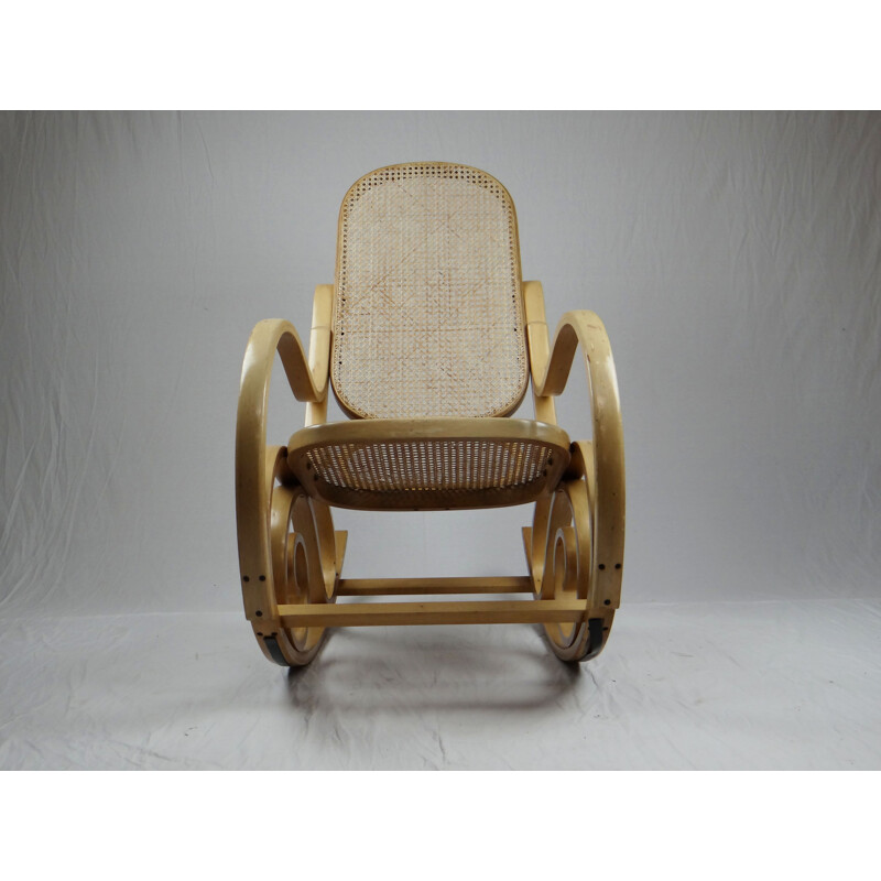 Vintage rocking chair in canage