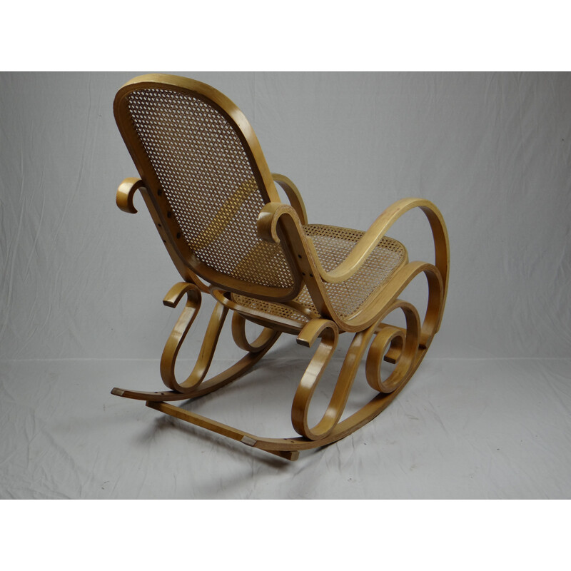 Vintage rocking chair in canage