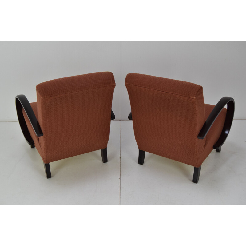 Pair of mid-century fabric and wood armchairs by Jindrich Halabala, Czechoslovakia 1950s