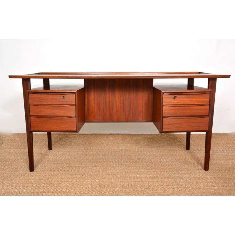 Scandinavian vintage teak desk by Peter Lovig Nielsen