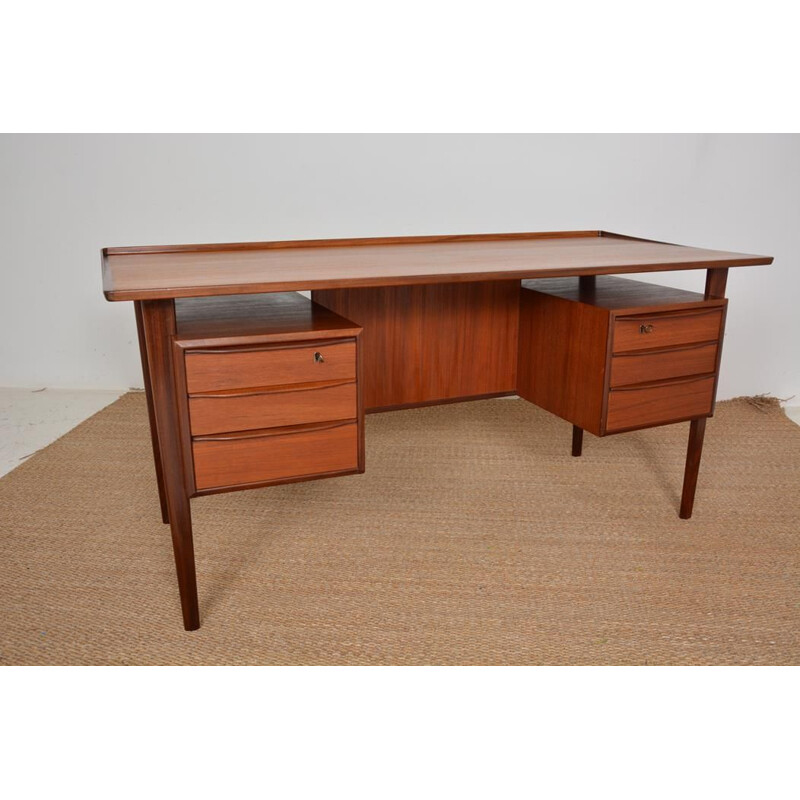 Scandinavian vintage teak desk by Peter Lovig Nielsen