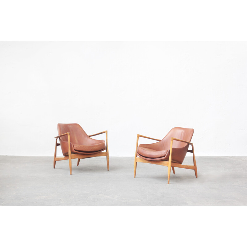 Pair of vintage Danish leather and nutwood armchairs by Ib Kofod Larsen for G. Laauser, Denmark 1960s