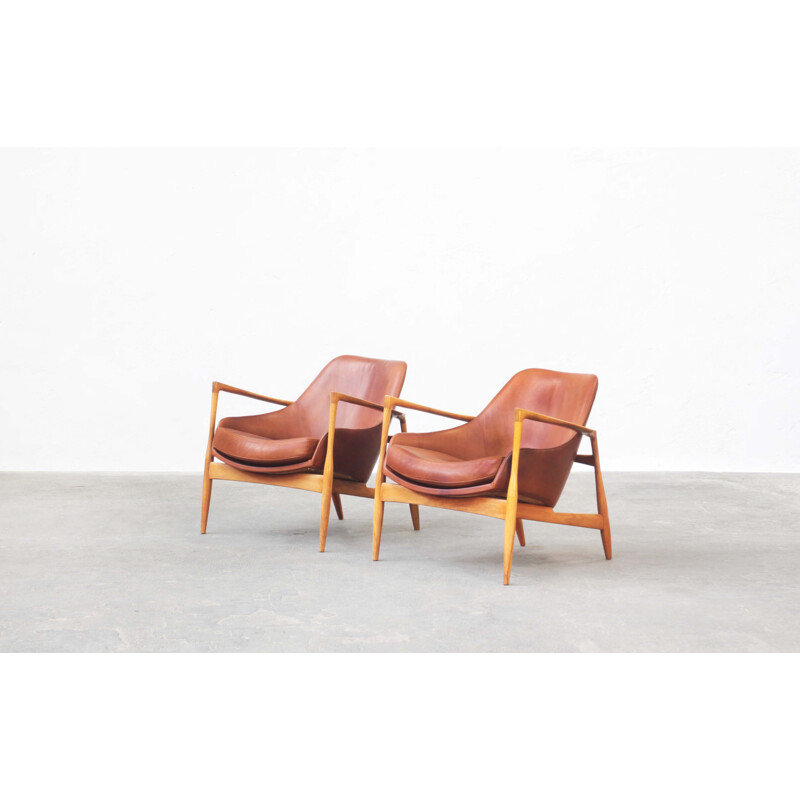 Pair of vintage Danish leather and nutwood armchairs by Ib Kofod Larsen for G. Laauser, Denmark 1960s