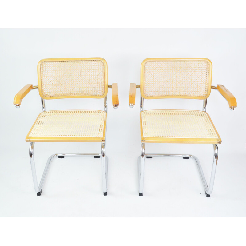 Pair of vintage wooden and rattan armchairs with armrests, 1970s
