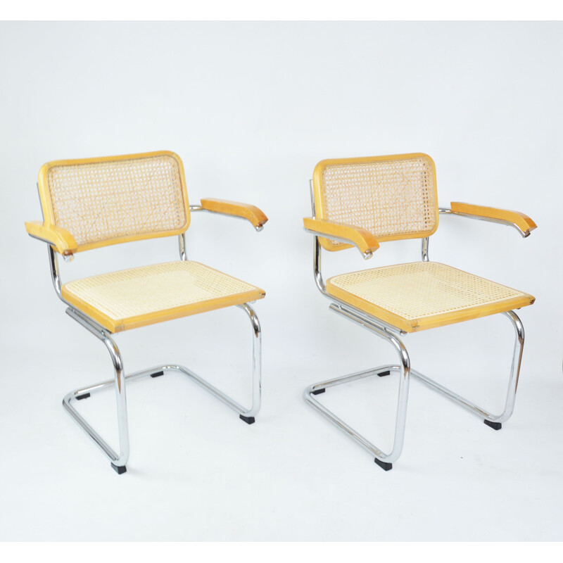 Pair of vintage wooden and rattan armchairs with armrests, 1970s