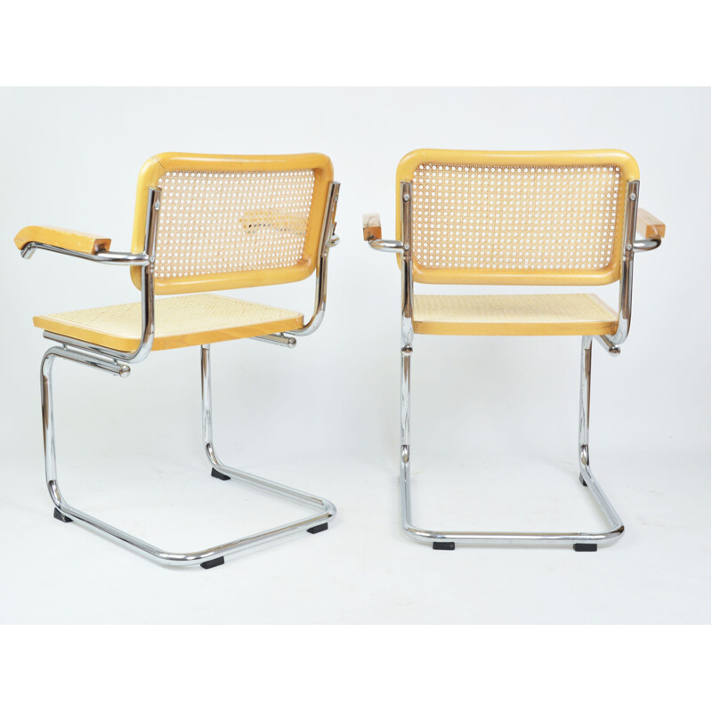 Pair of vintage wooden and rattan armchairs with armrests, 1970s