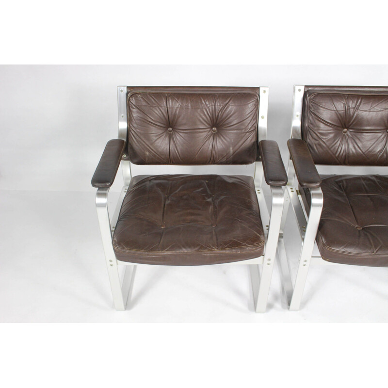 Set of 4 Swedish mid century leather and aluminum armchairs by Karl Erik Ekselius for Joc Vetlanda