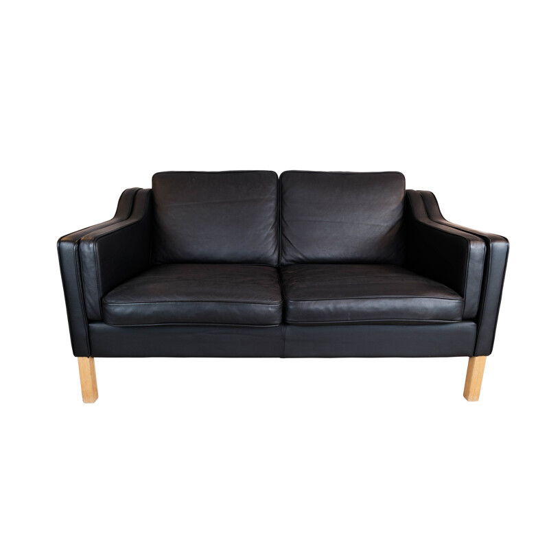 Vintage black leather 2 seater sofa with oak legs by Stouby Furniture, 1960