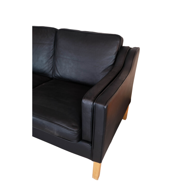 Vintage 2-Sitzer-Sofa aus schwarzem Leder mit Eichenholzfüßen von Stouby Furniture, 1960