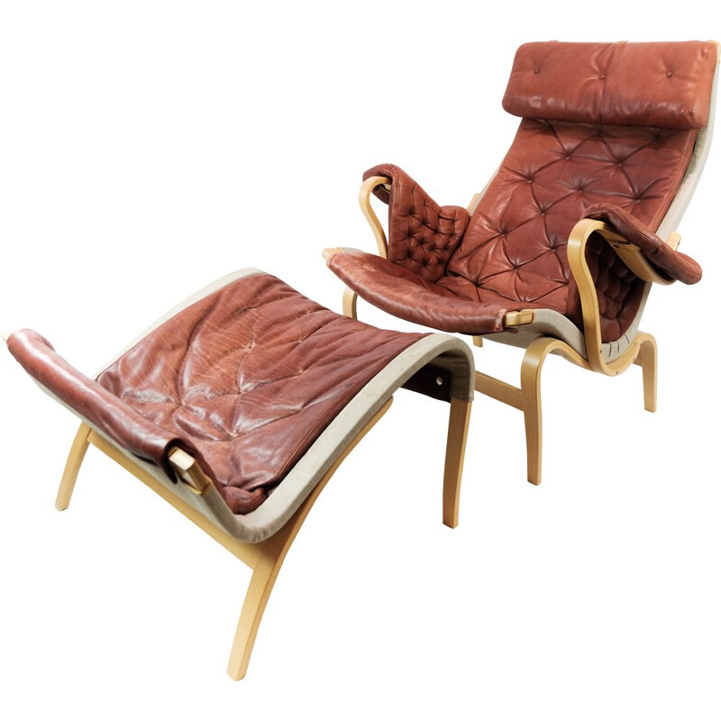 Fauteuil lounge avec ottomane vintage Pernilla en cuir rouge par Bruno Mathsson, 1970