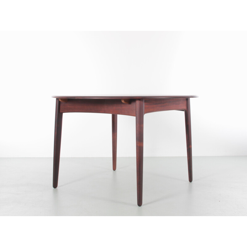 Scandinavian vintage round table with 2 extensions in Rio rosewood 