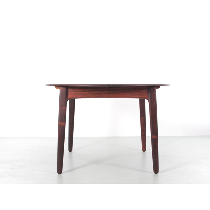 Scandinavian vintage round table with 2 extensions in Rio rosewood 